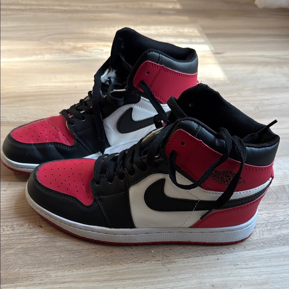 Nike “Air Jordan” Black and Red Jordan 1 Retro High OG